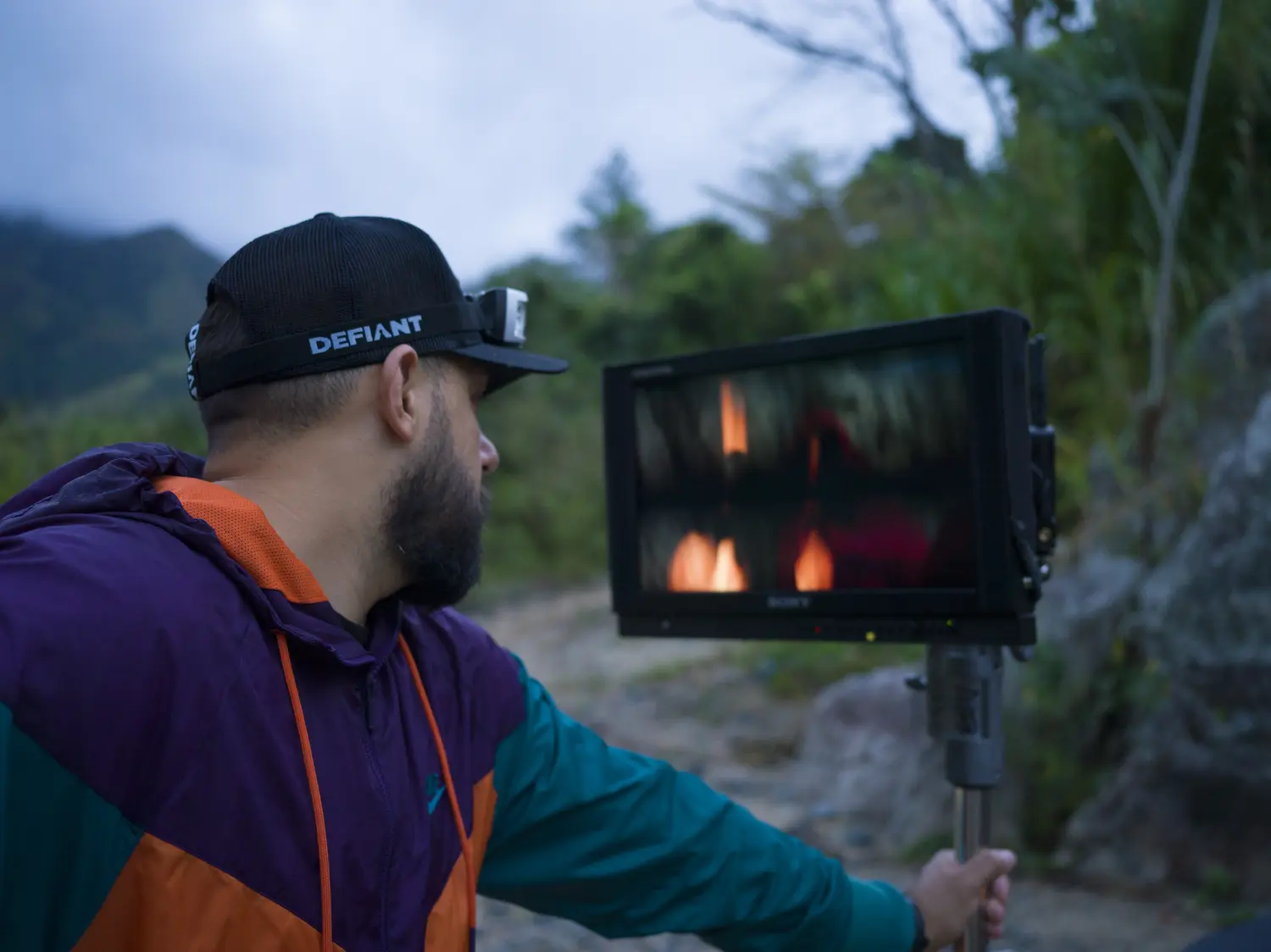 Poster frame: a monitor on set showing the fire scene
